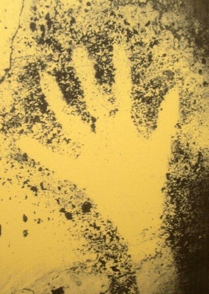 Stencil of a human hand from Cosquer Cave, dated 27,000 B.P., as shown at the National Museum of Archeology, Saint-Germain-en-Laye, France